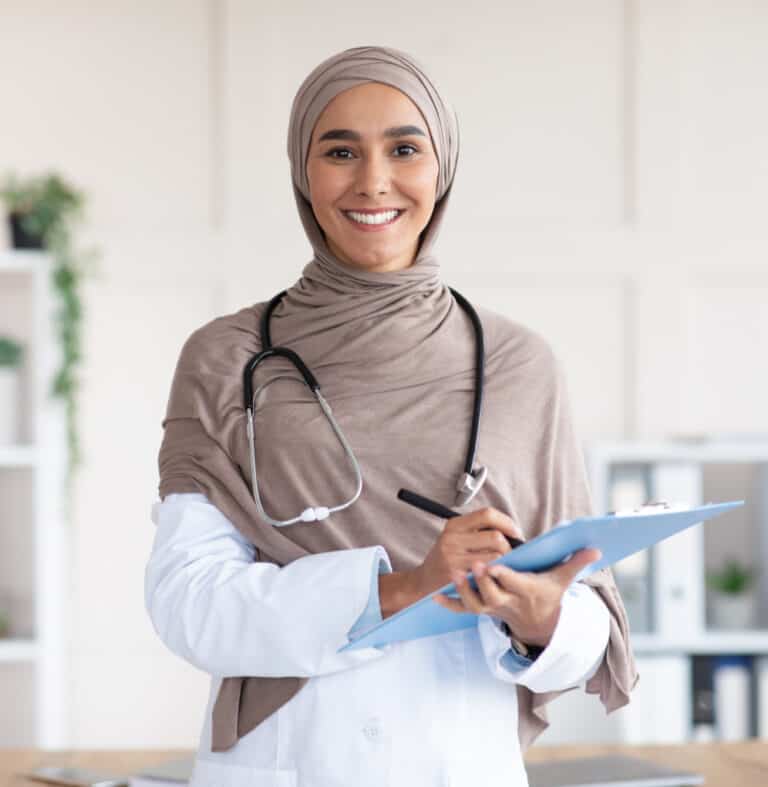 cheerful-pretty-woman-in-hijab-doctor-posing-in-ca-2023-11-27-04-48-52-utc 2