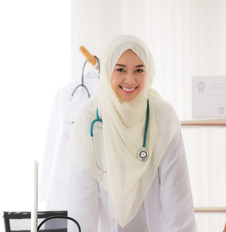 cheerful-pretty-woman-in-hijab-doctor-posing-in-ca-2023-11-27-04-48-52-utc 4